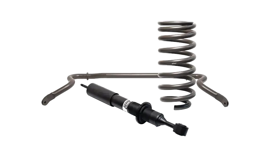 Eine Metall-Schraubenfeder und ein schwarzer Stoßdämpfer werden auf einem schlichten weißen Hintergrund als Komponenten der Fahrzeugaufhängung dargestellt, um die Fahrstabilität hervorzuheben. Im Hintergrund ist ein schwacher deutscher Text zu sehen.