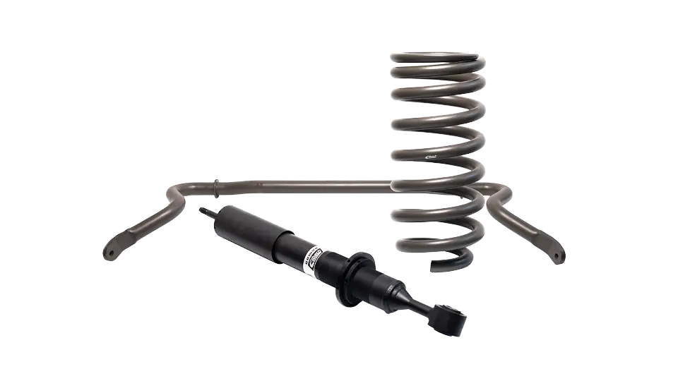 Ein schwarzer Stoßdämpfer, eine Spiralfeder und ein Stabilisator sind auf weißem Hintergrund abgebildet und heben die wichtigsten Aufhängungskomponenten hervor, die für spezielle Fahrzeuge zur Verbesserung der Fahrstabilität entwickelt wurden.