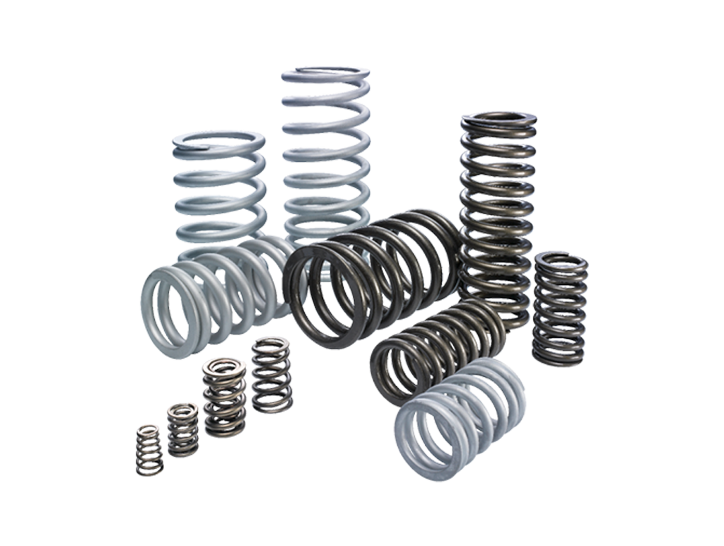Eine Gruppe von Metallspiralfedern, darunter Eibach Ventilfedern und Federn für Einspritzsysteme, in verschiedenen Größen und Farben - silber und schwarz - stehen aufrecht aneinander gelehnt auf einem weißen Hintergrund.